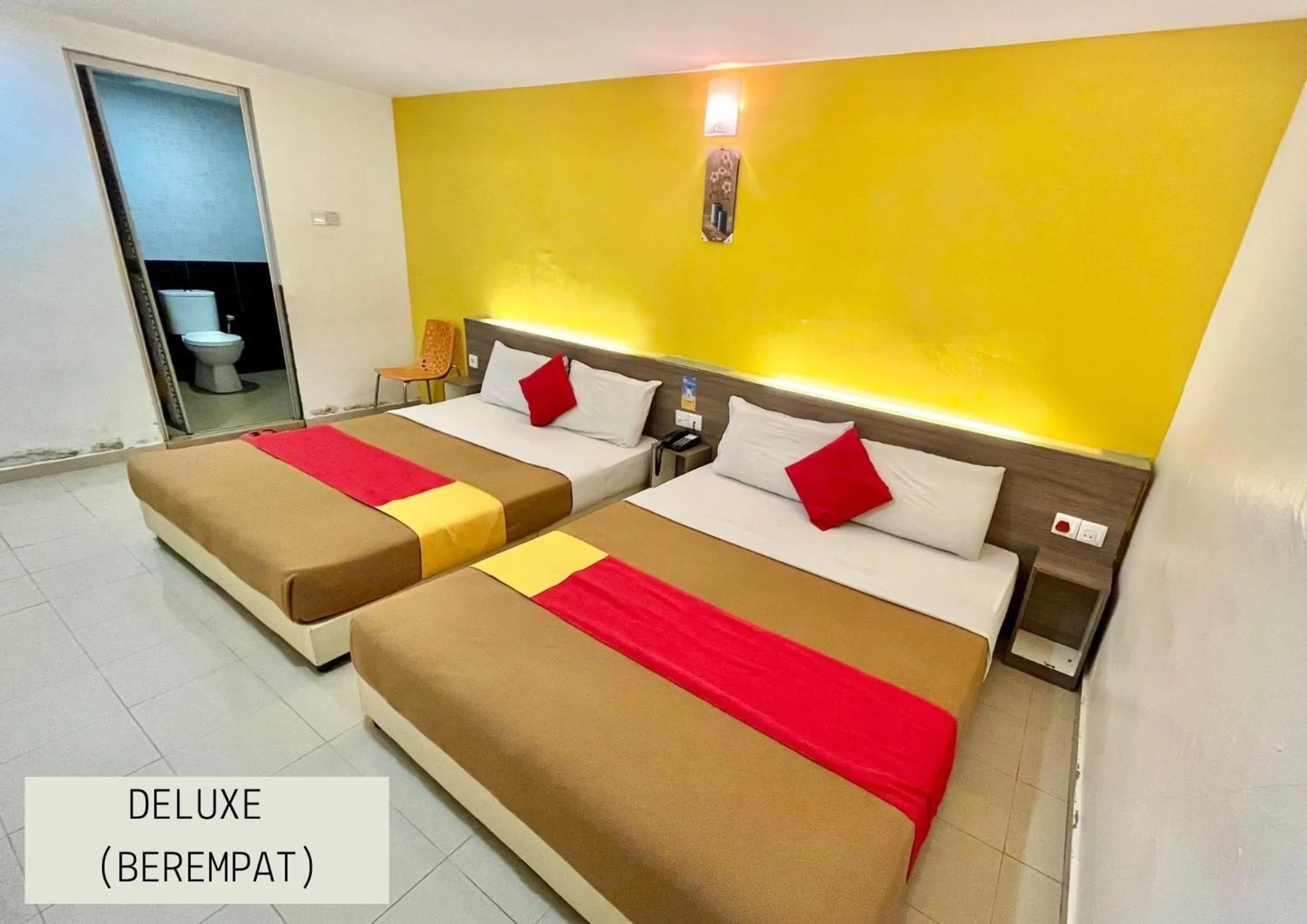 Bed in Yellow Mansion Hotel Melaka Raya