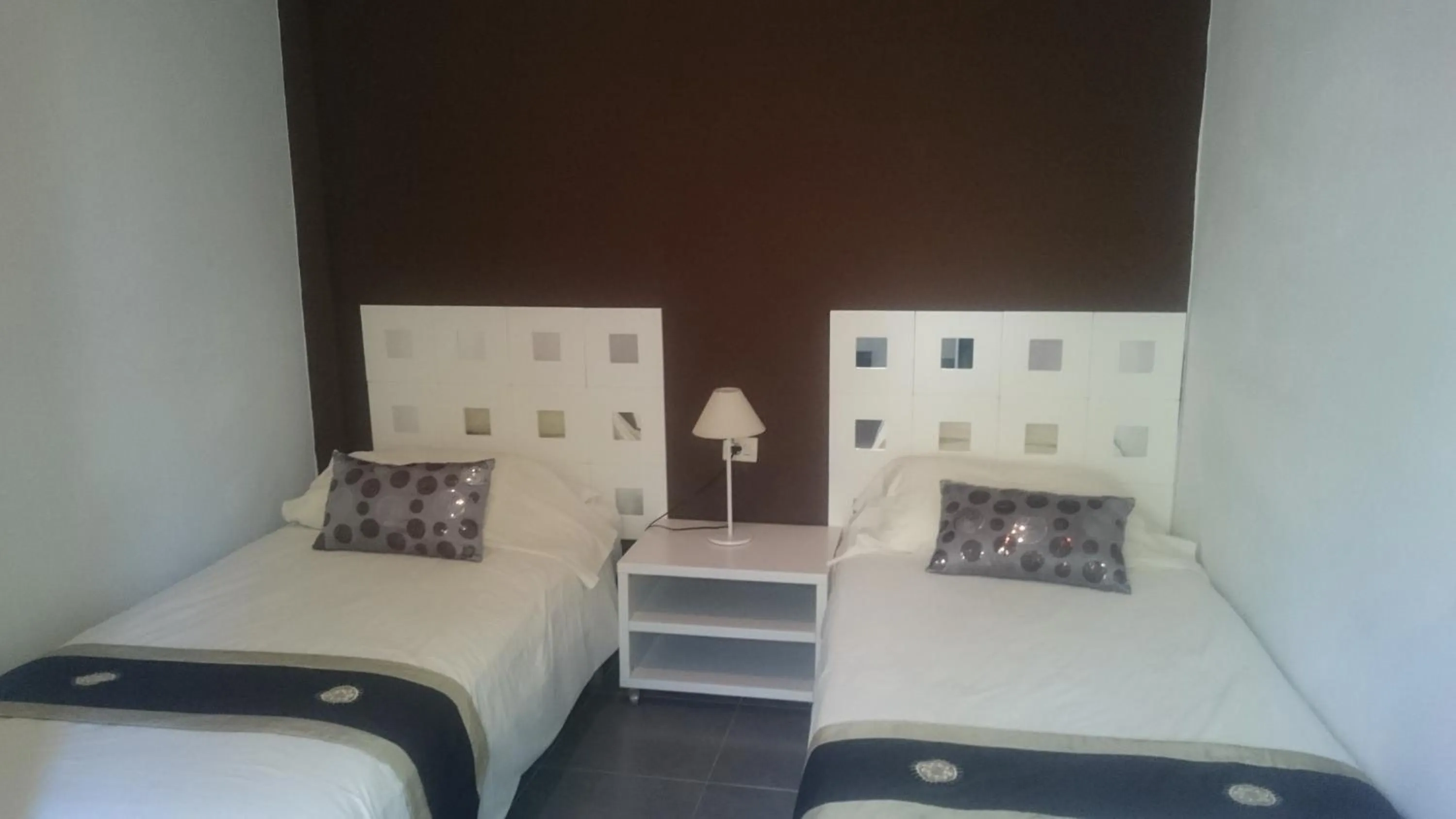 Bed in Apartamentos El Patio