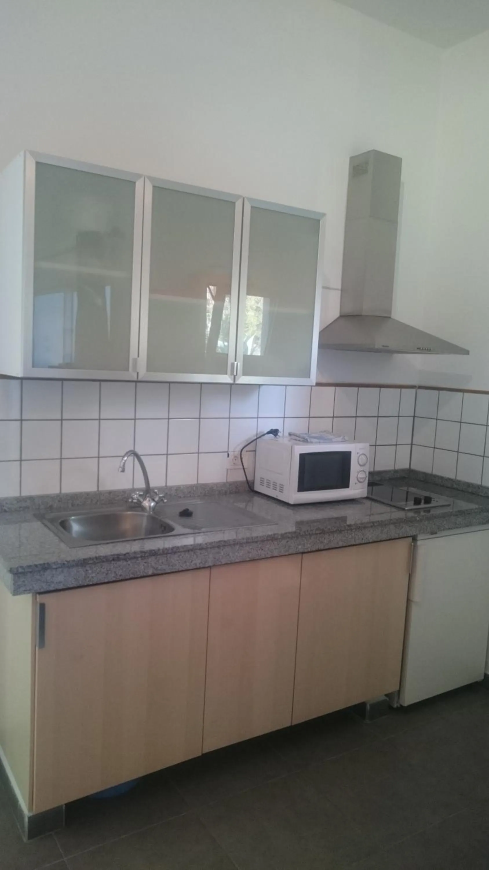 Kitchen or kitchenette in Apartamentos El Patio