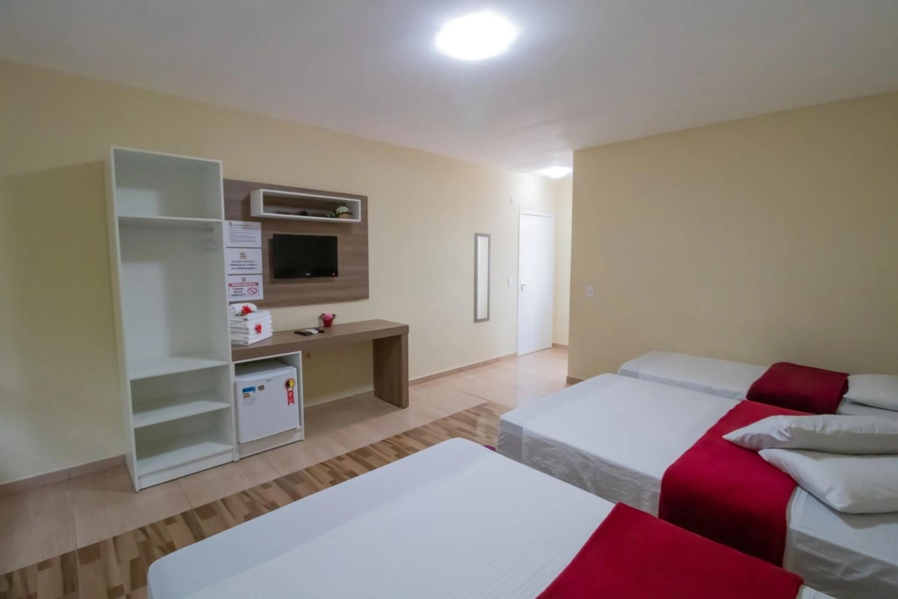 Bed in Pousada Vovó Dilma