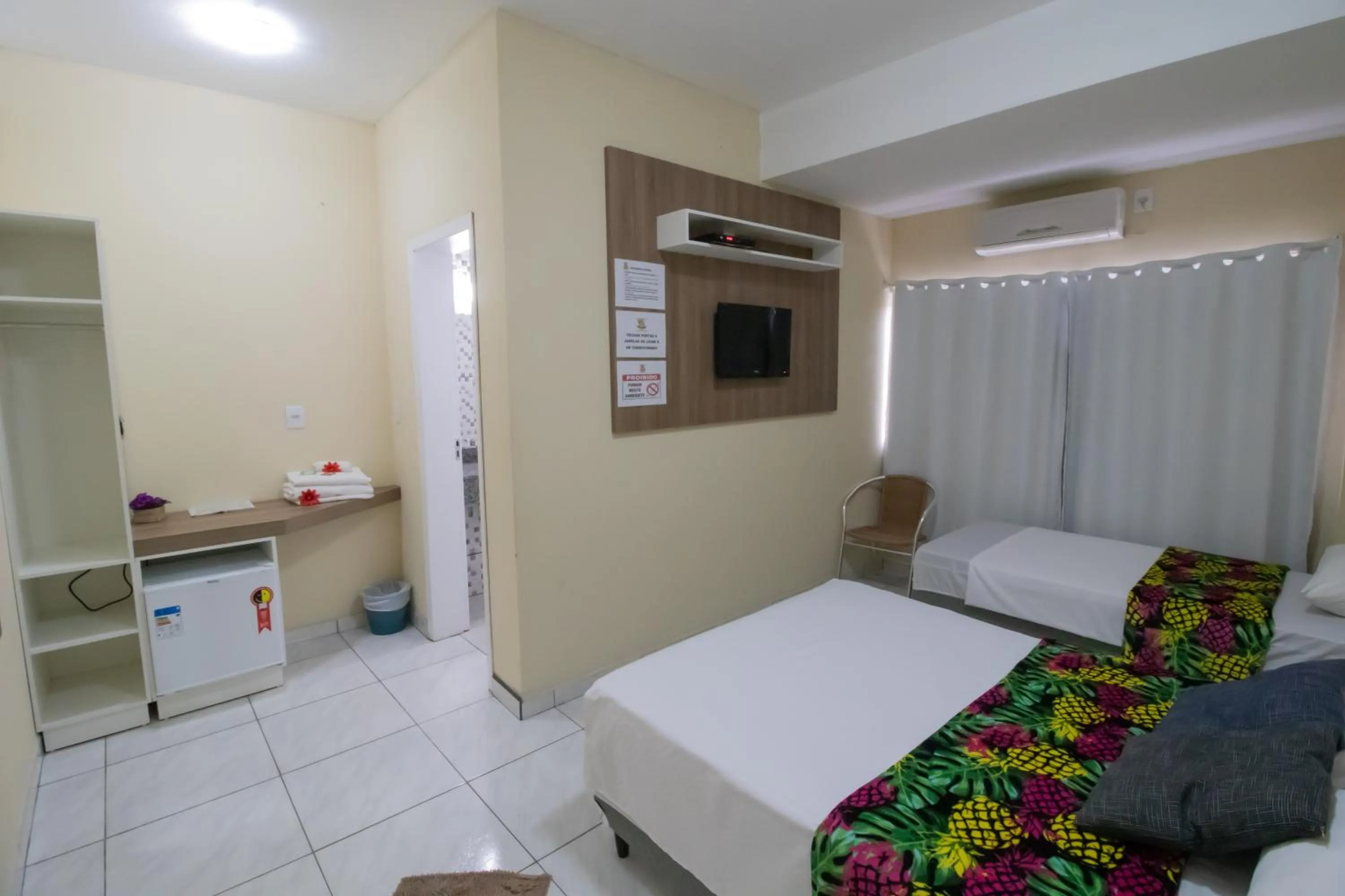 Bed in Pousada Vovó Dilma