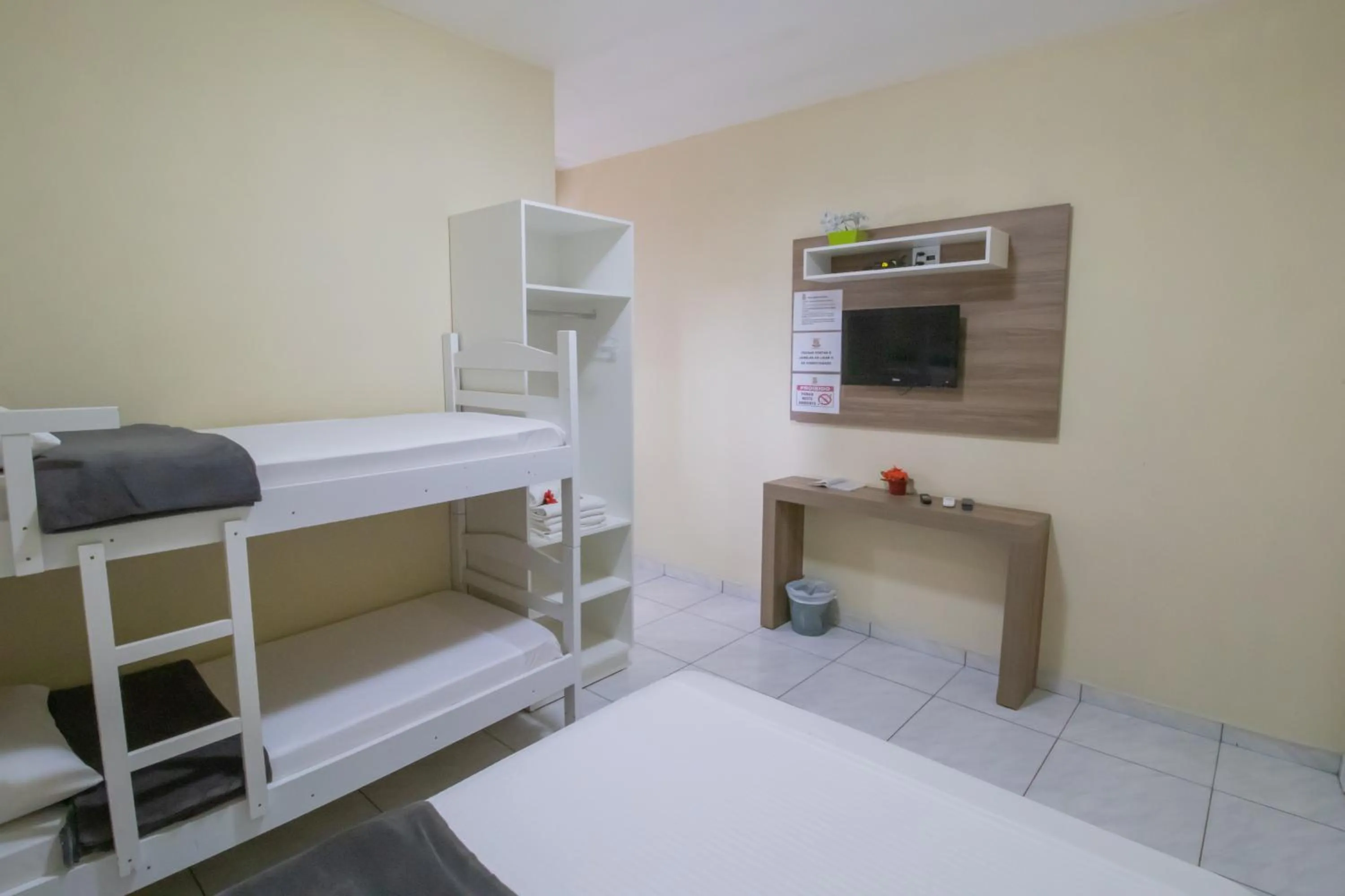 Bed in Pousada Vovó Dilma