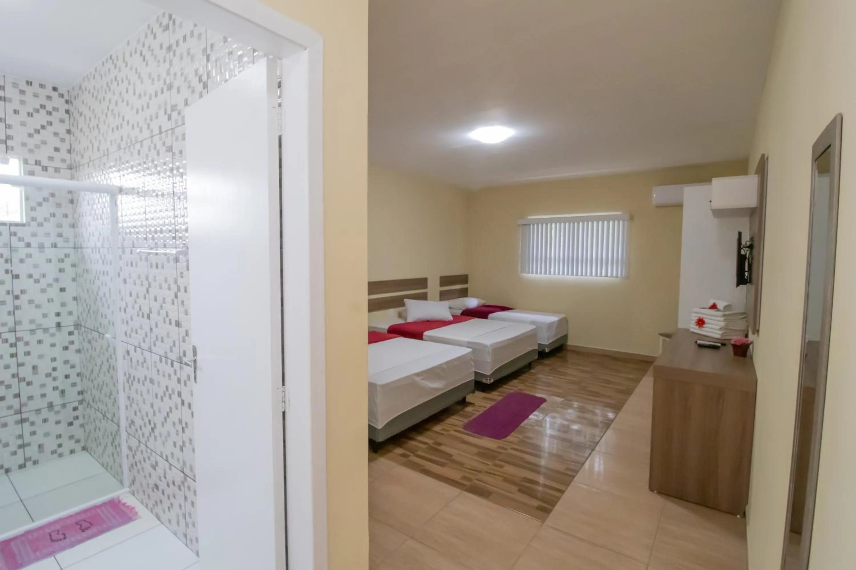 Bed in Pousada Vovó Dilma