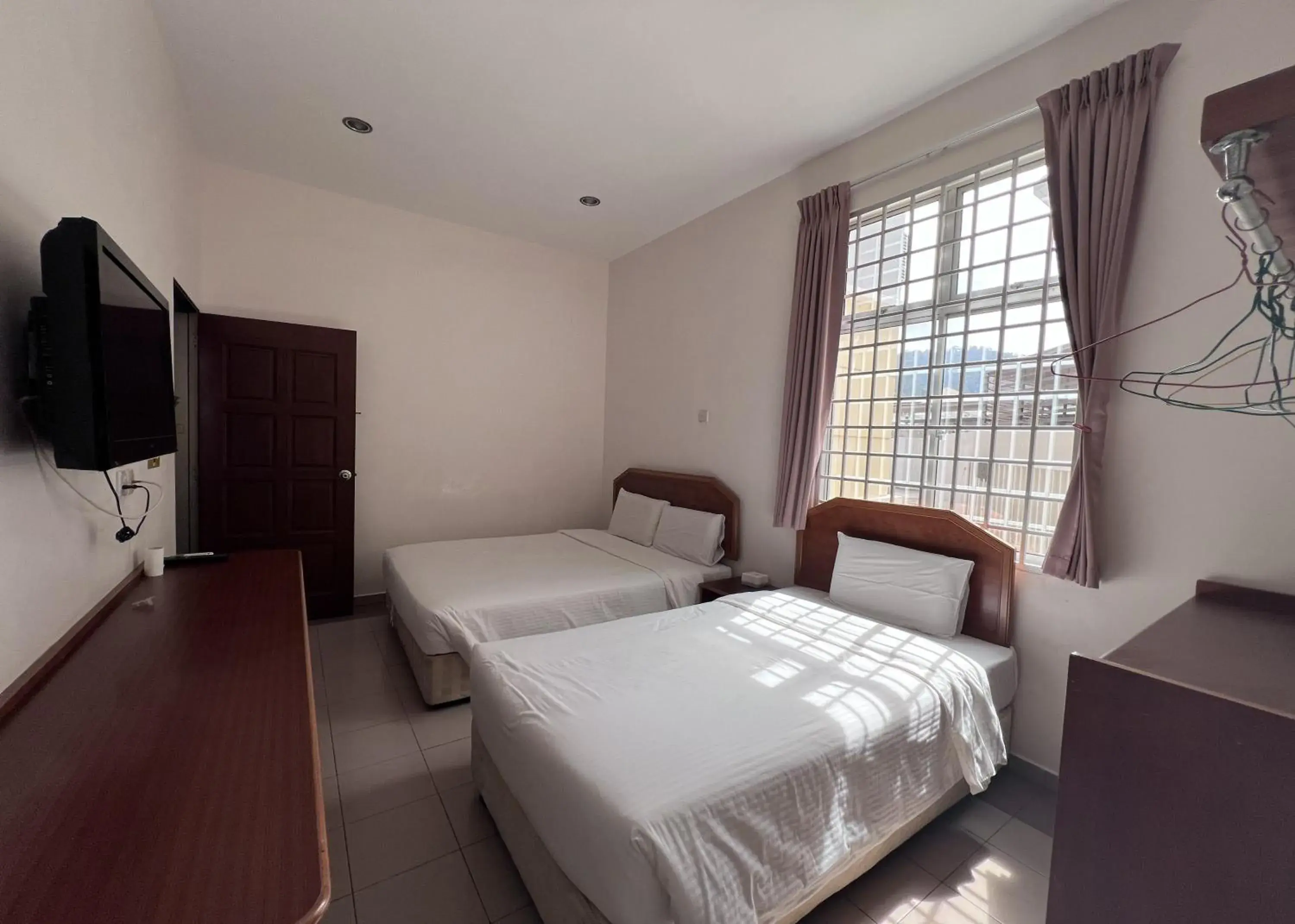 Standard Triple Room in SL Villa Guesthouse, Kuantan Standard Triple Room in SL Villa Guesthouse, Kuantan