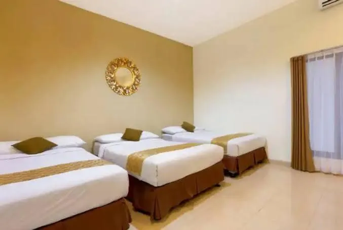 Bed in The Bali Rama City Hotel