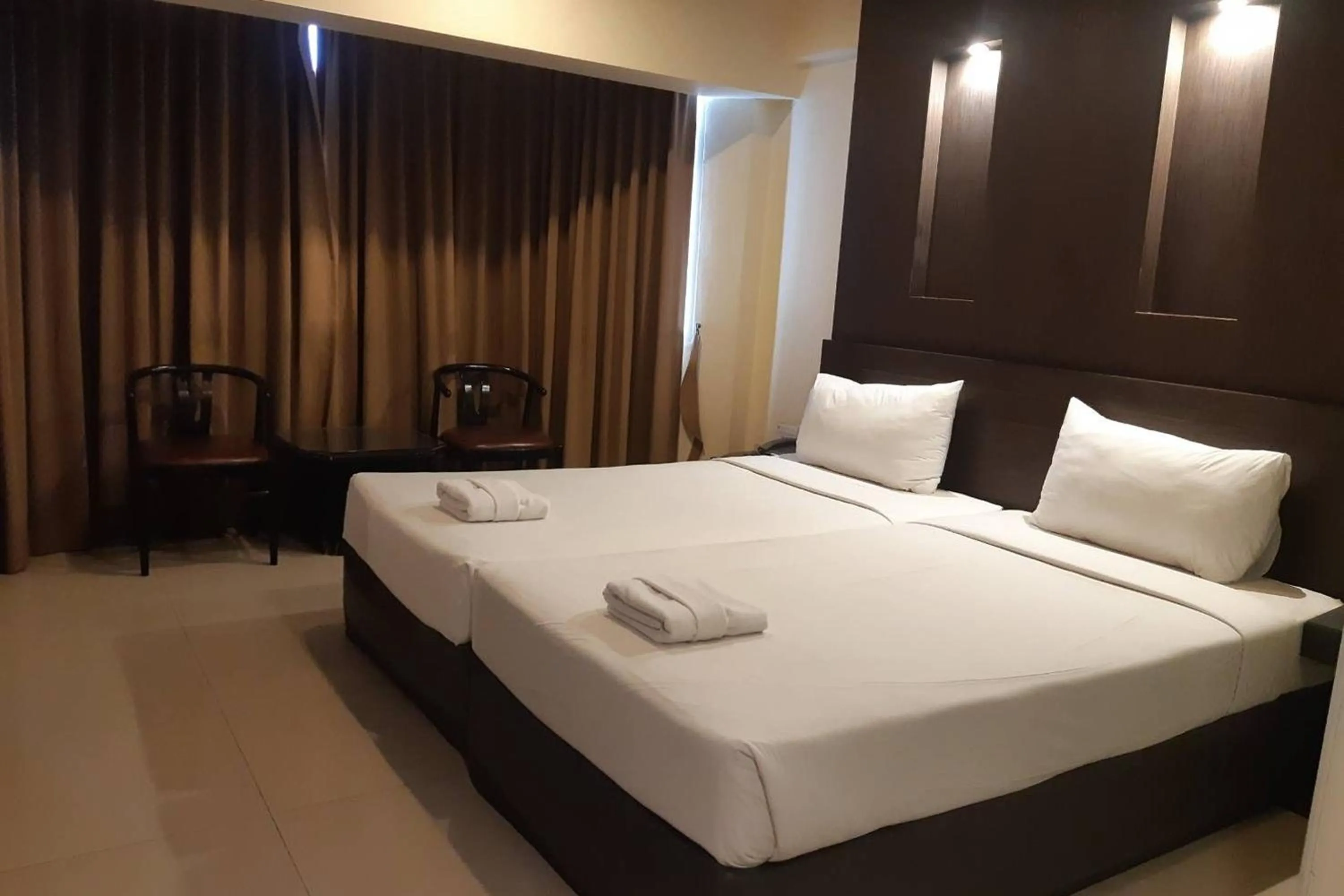 Bedroom in Suncity Hotel Pattaya