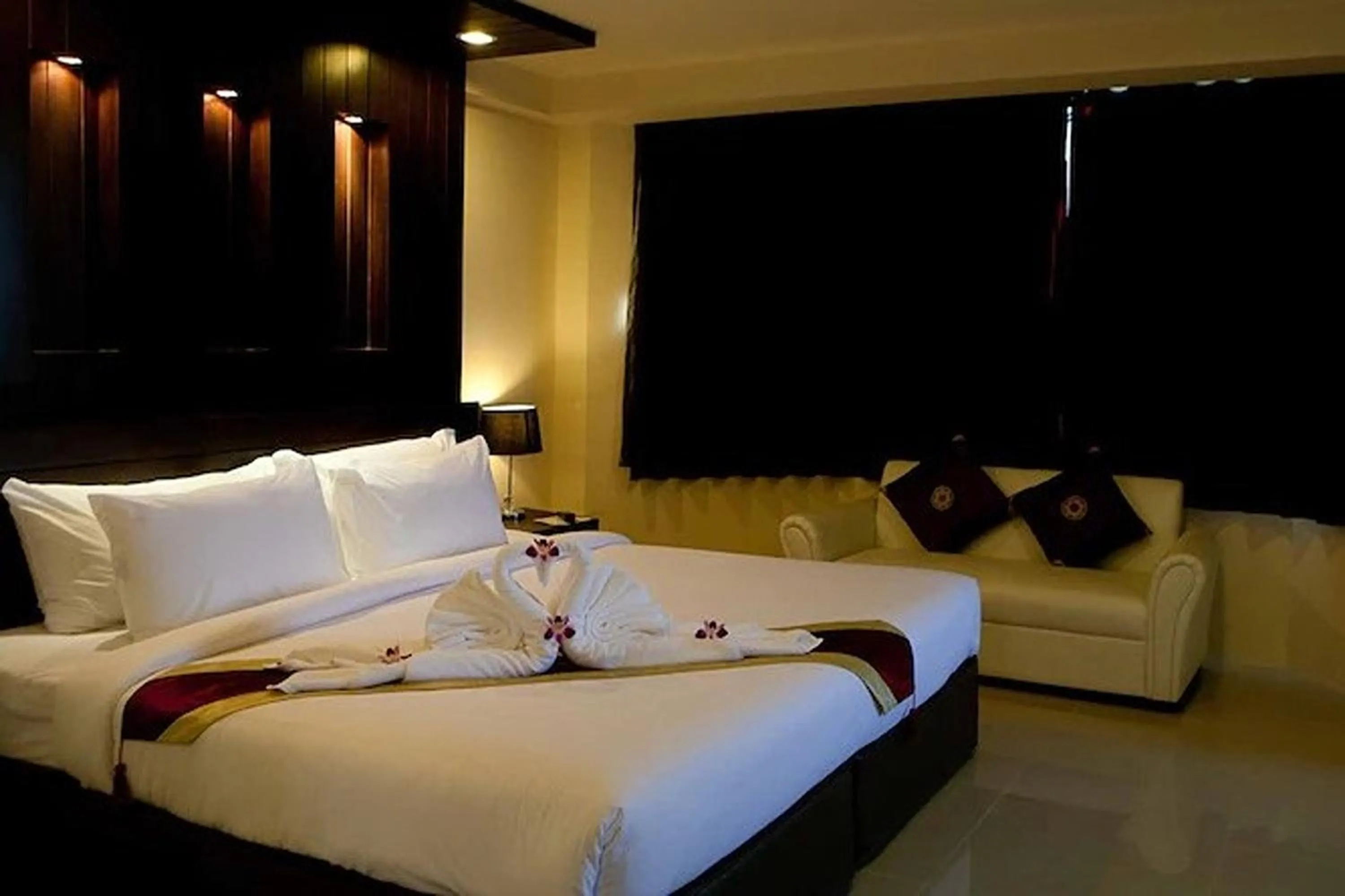 Bed in Suncity Hotel Pattaya