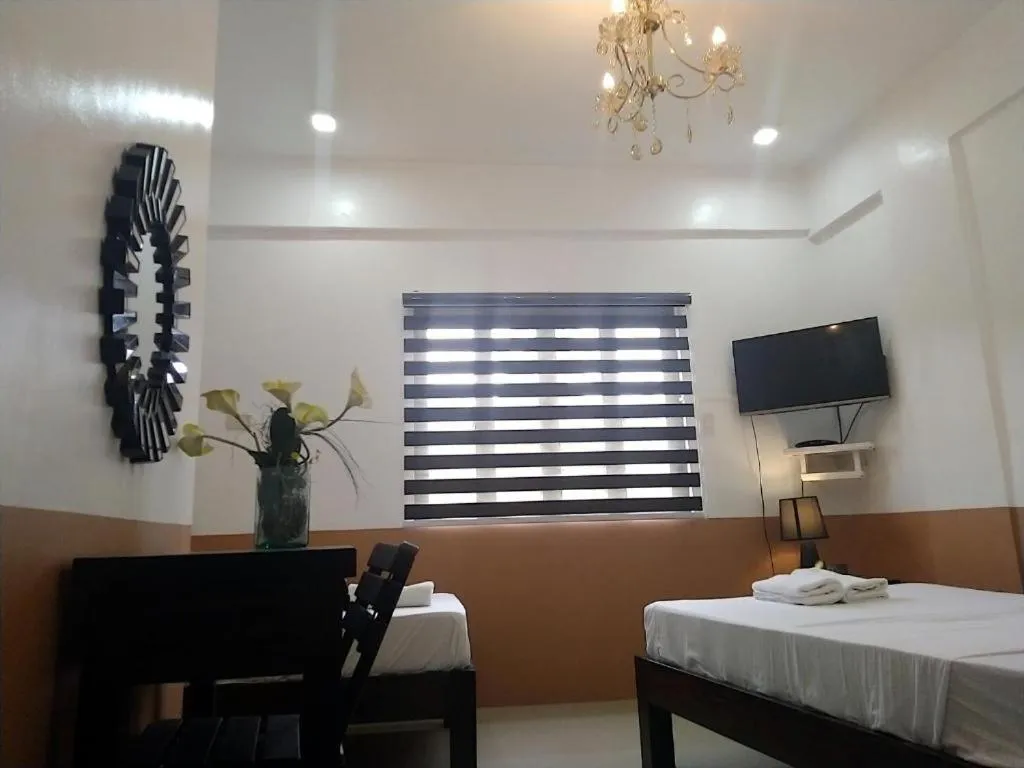 Bed in Jil's Apartelle