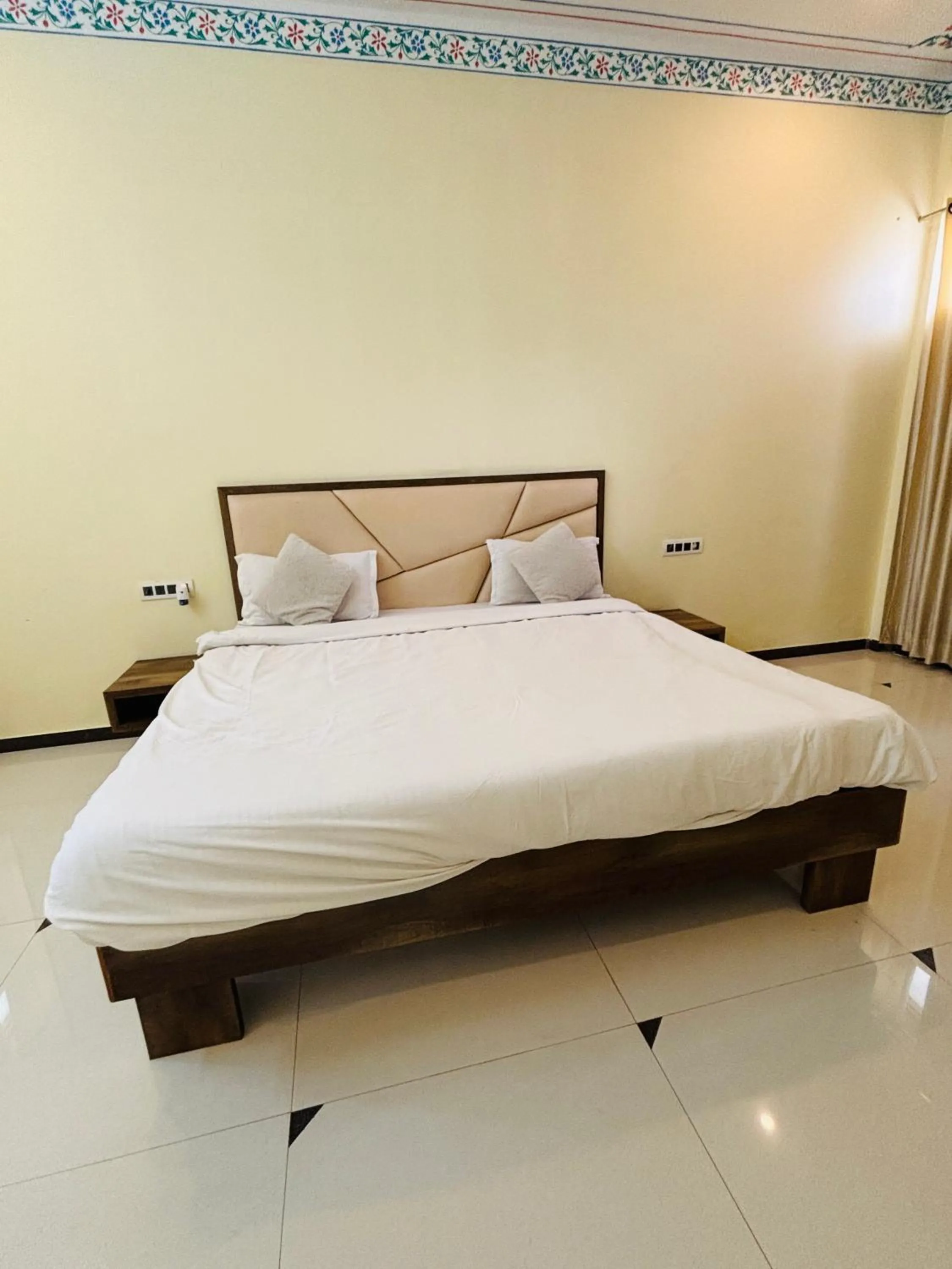 Bed in Shiv Ashray Resort