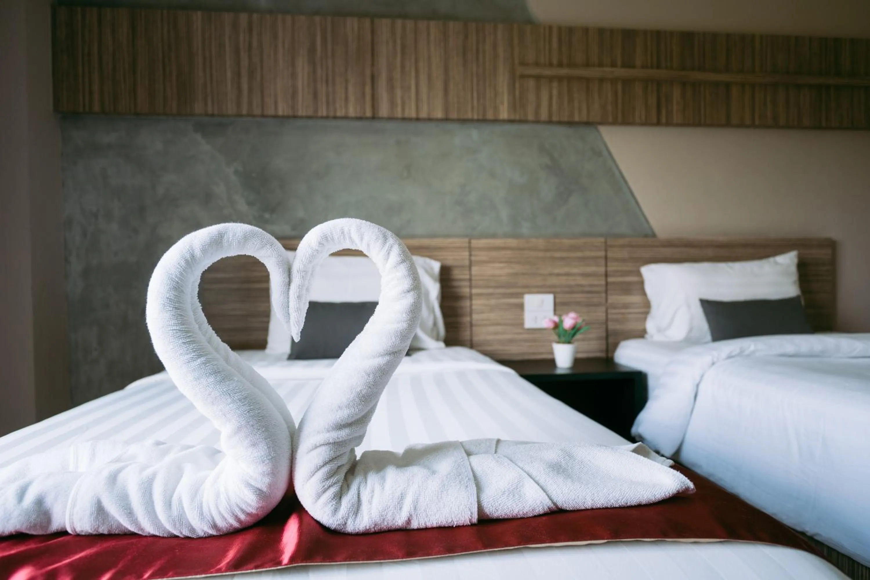 Bed in Ray Hotel Buriram