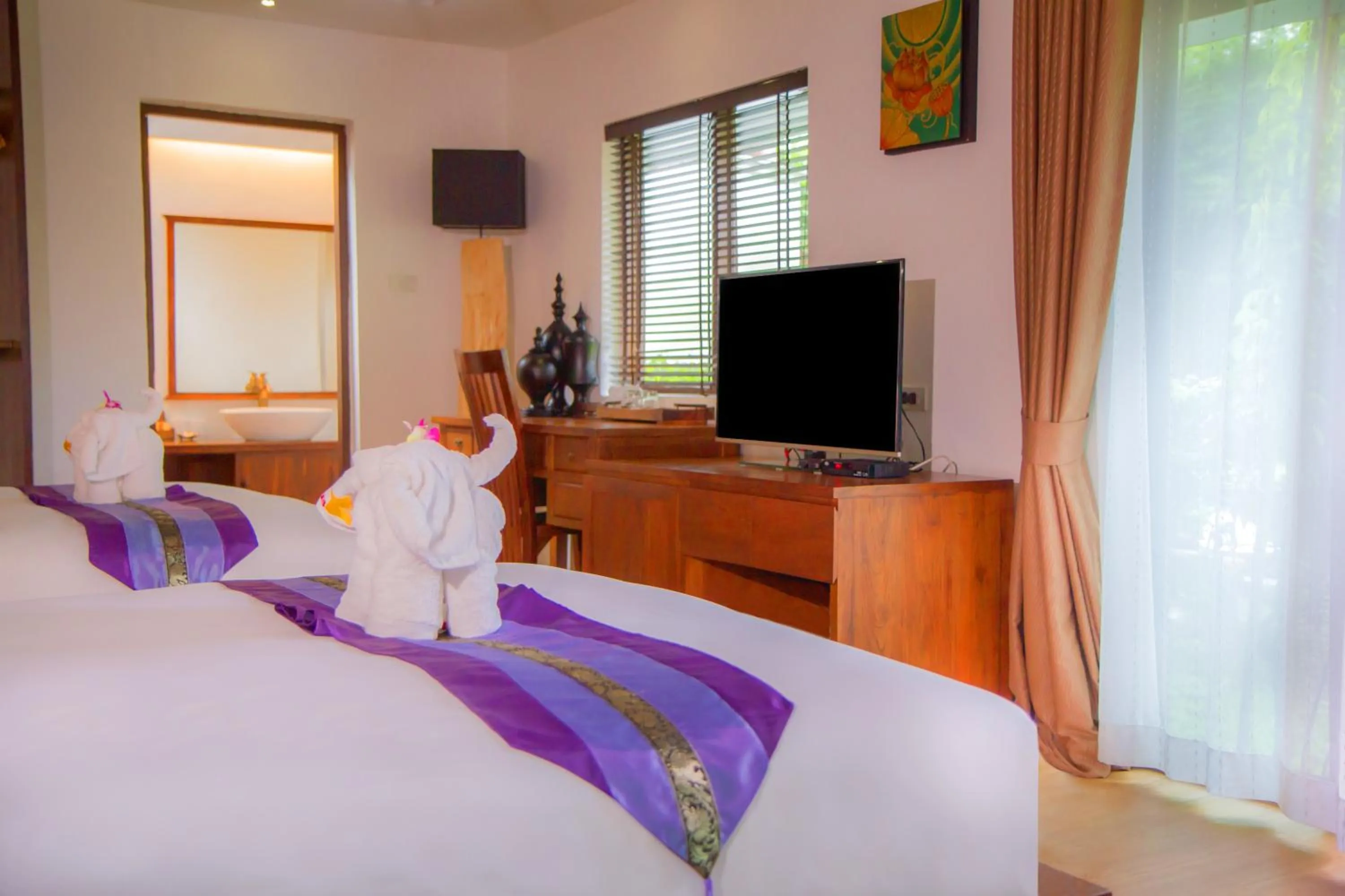 Photo of the whole room, Bed in E-outfitting Boutique Chiang Mai