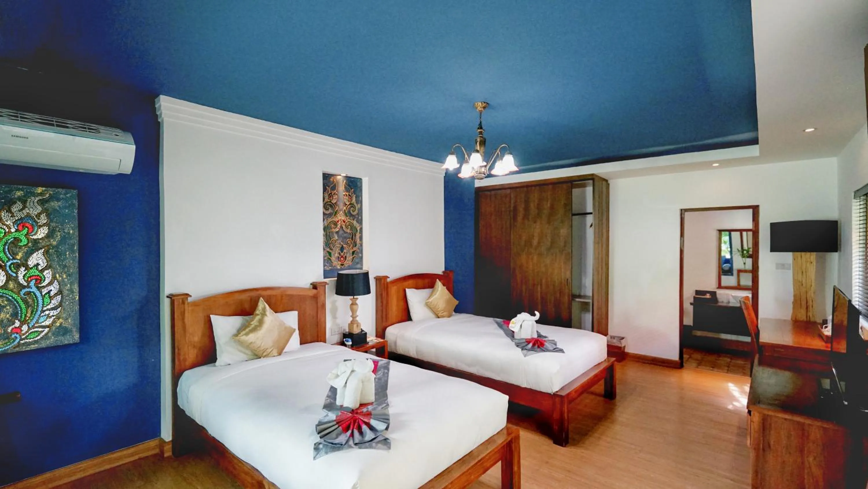 Photo of the whole room, Bed in E-outfitting Boutique Chiang Mai