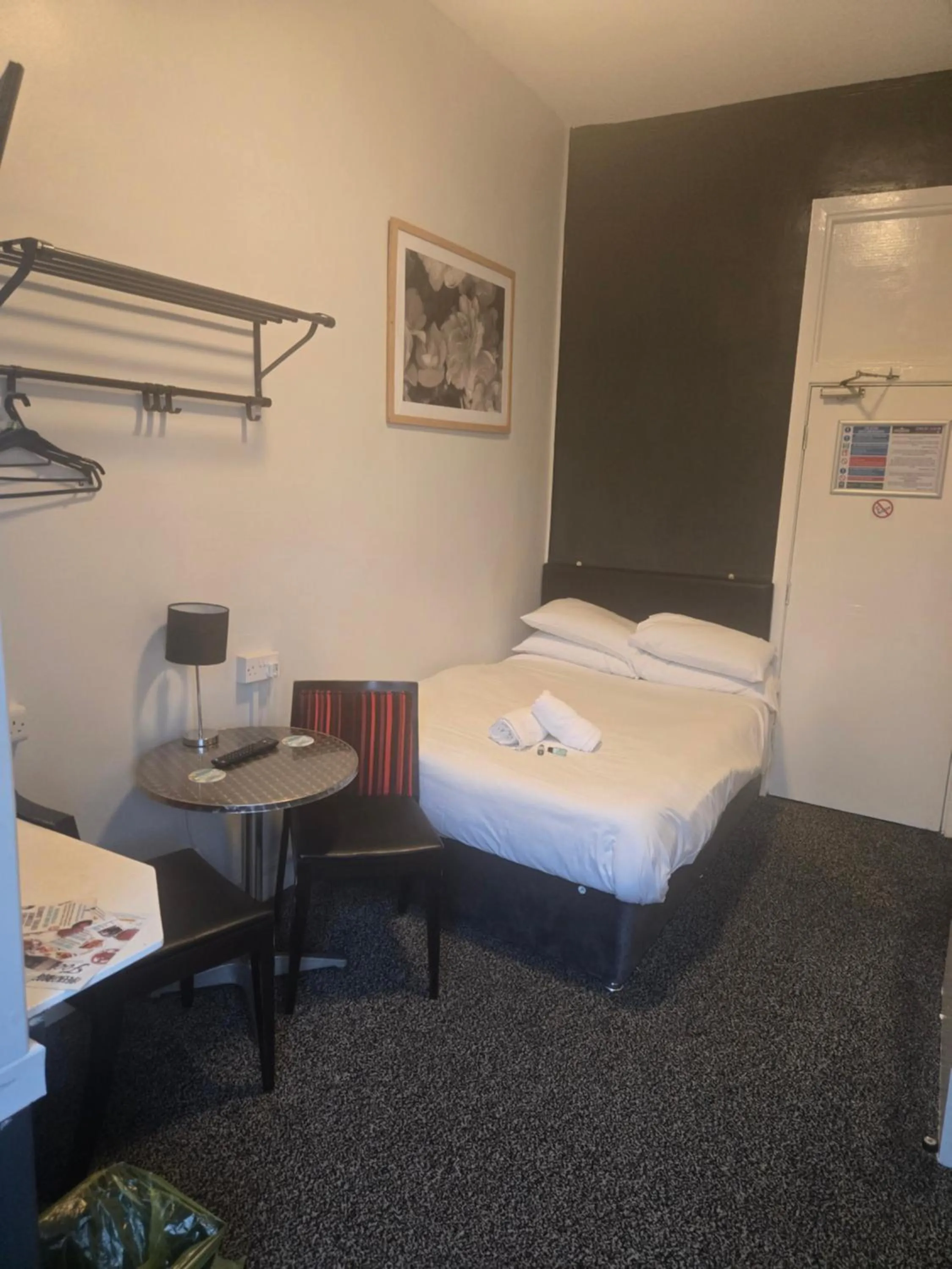 Bed in Peek-a-Booze - Budget Hotel - Adults Only