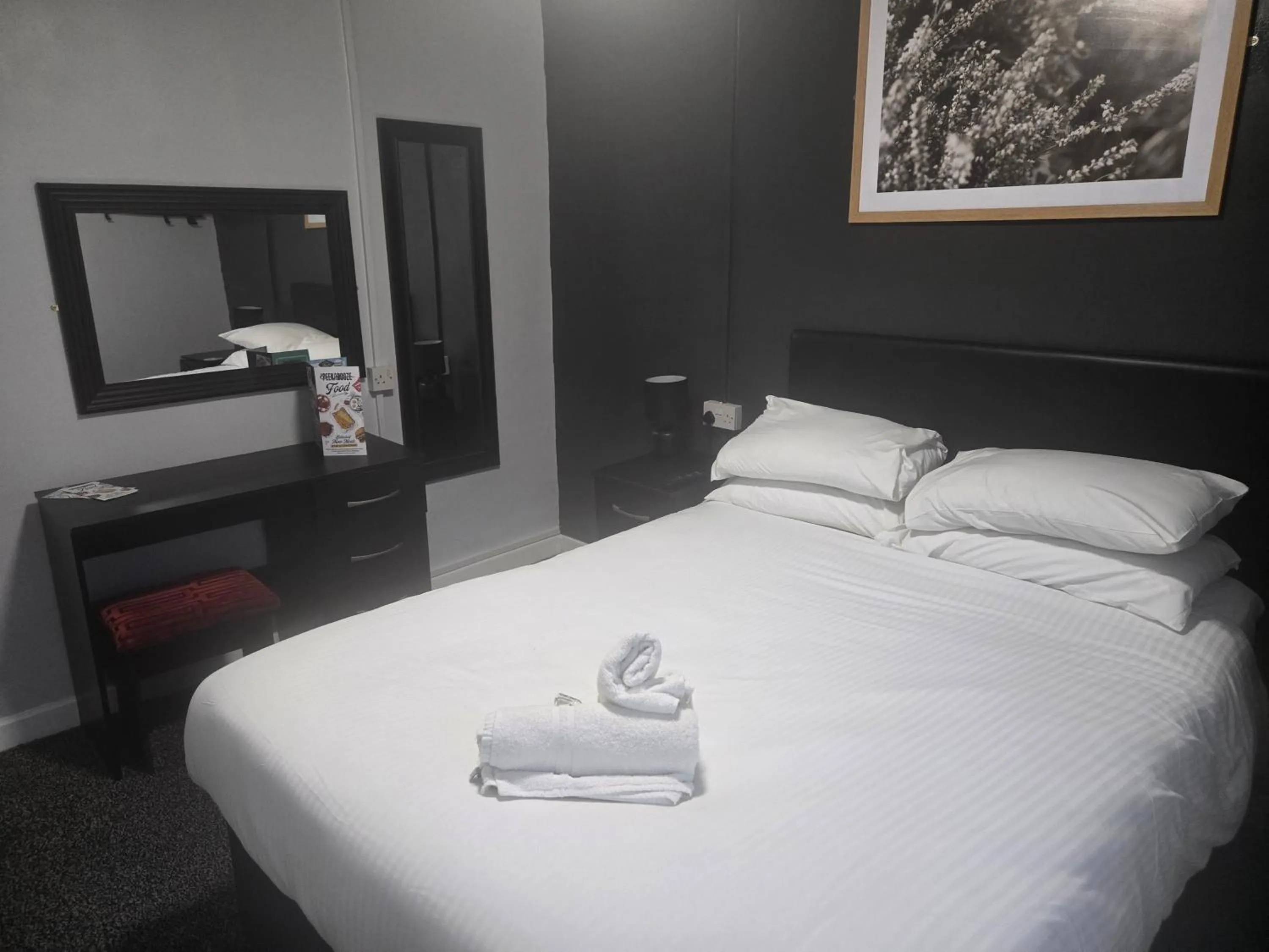 Bed in Peek-a-Booze - Budget Hotel - Adults Only