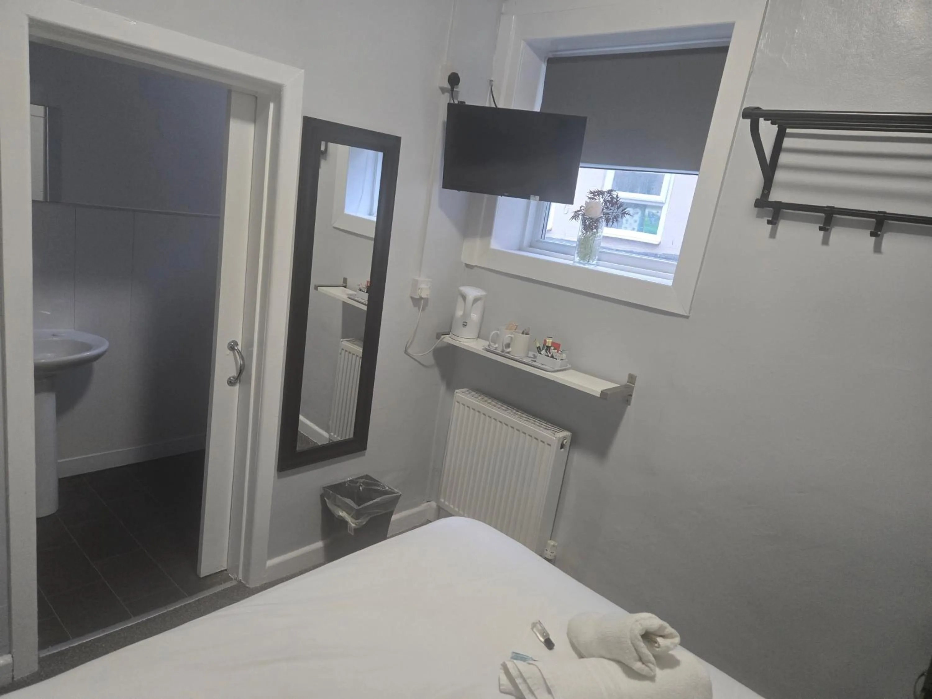 Bed in Peek-a-Booze - Budget Hotel - Adults Only