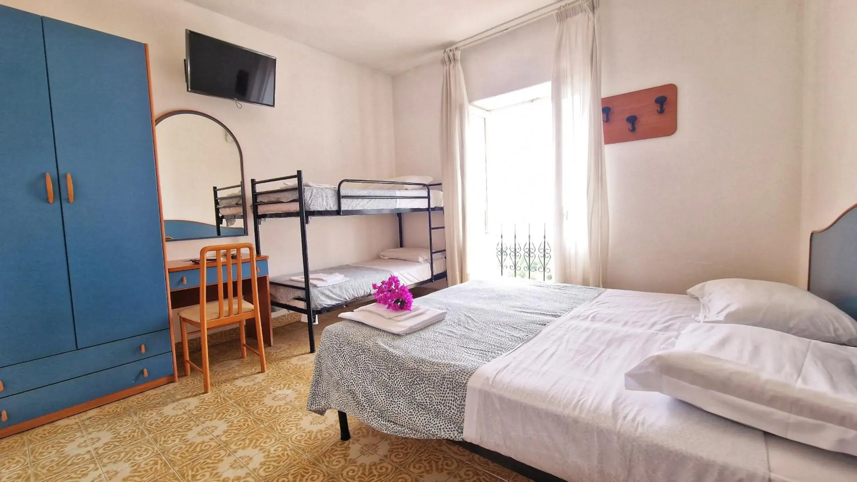 Quadruple Room with Balcony in Hotel Bellavista Quadruple Room with Balcony in Hotel Bellavista