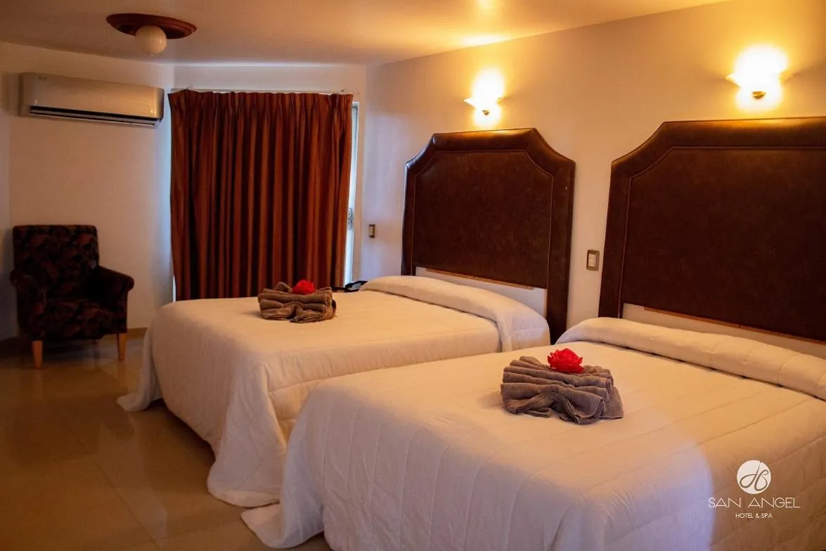 Bed in Hotel San Angel & Spa