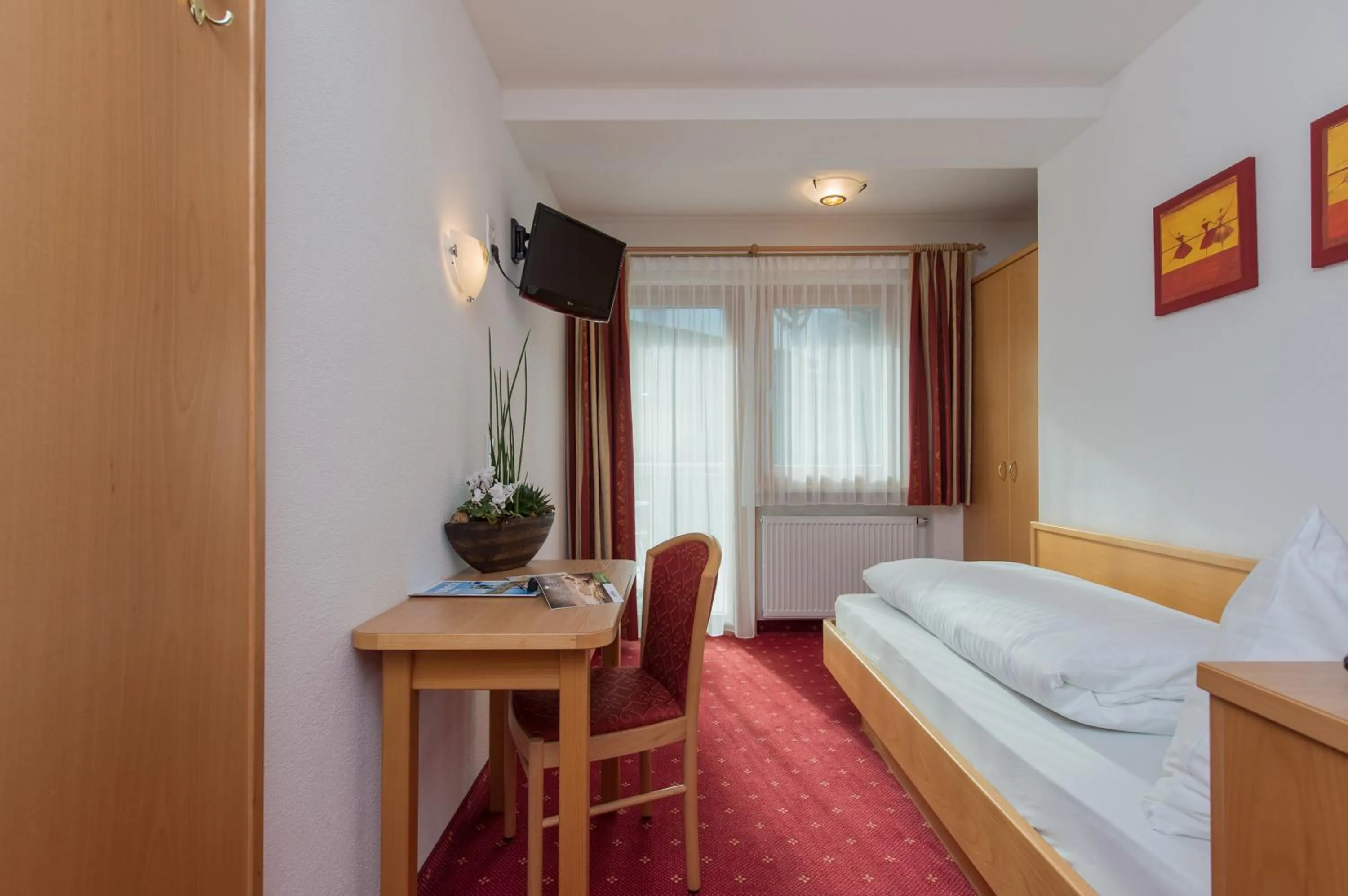 Bed in Hotel Garni Hochgruber