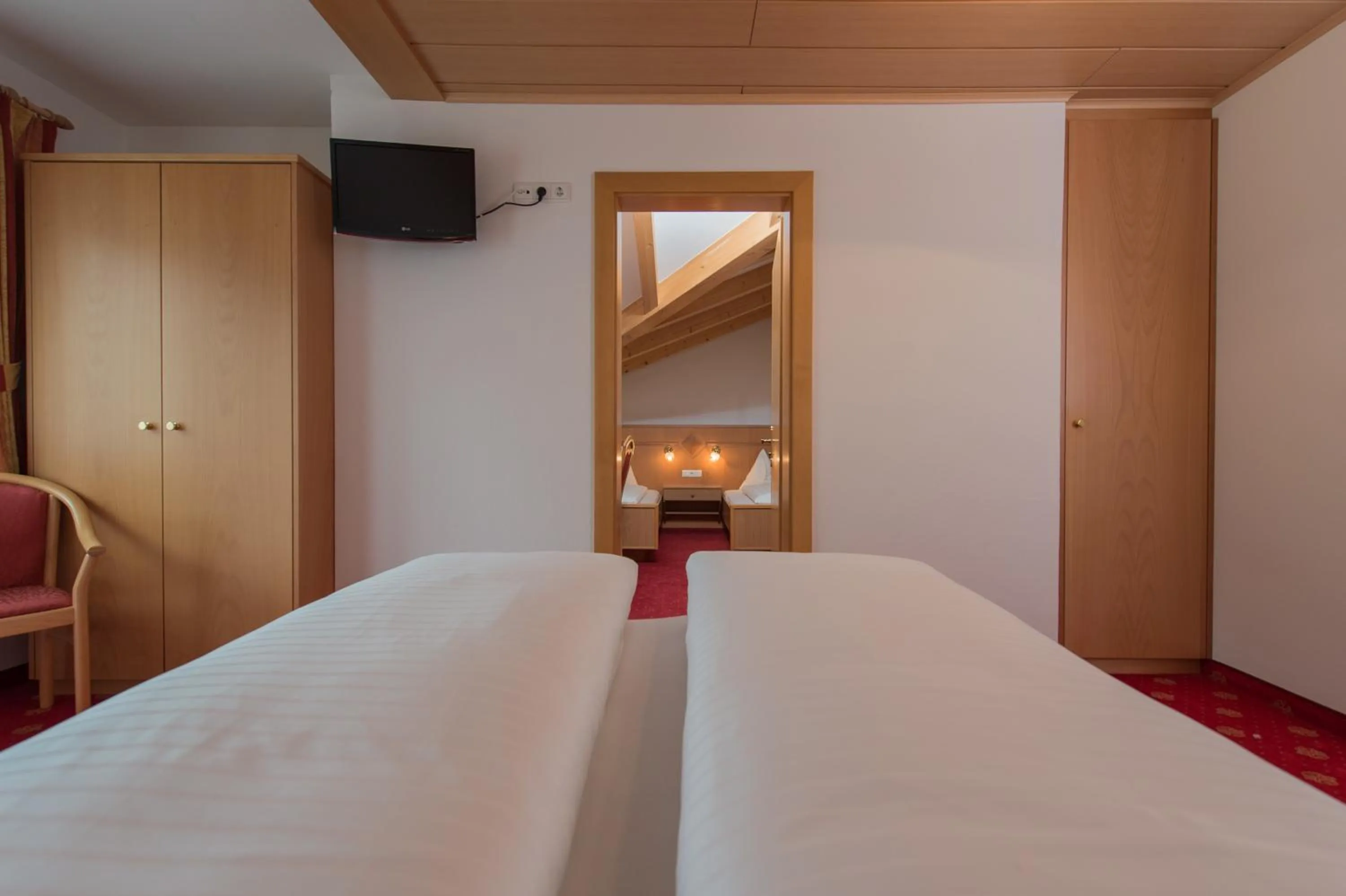 Bed in Hotel Garni Hochgruber