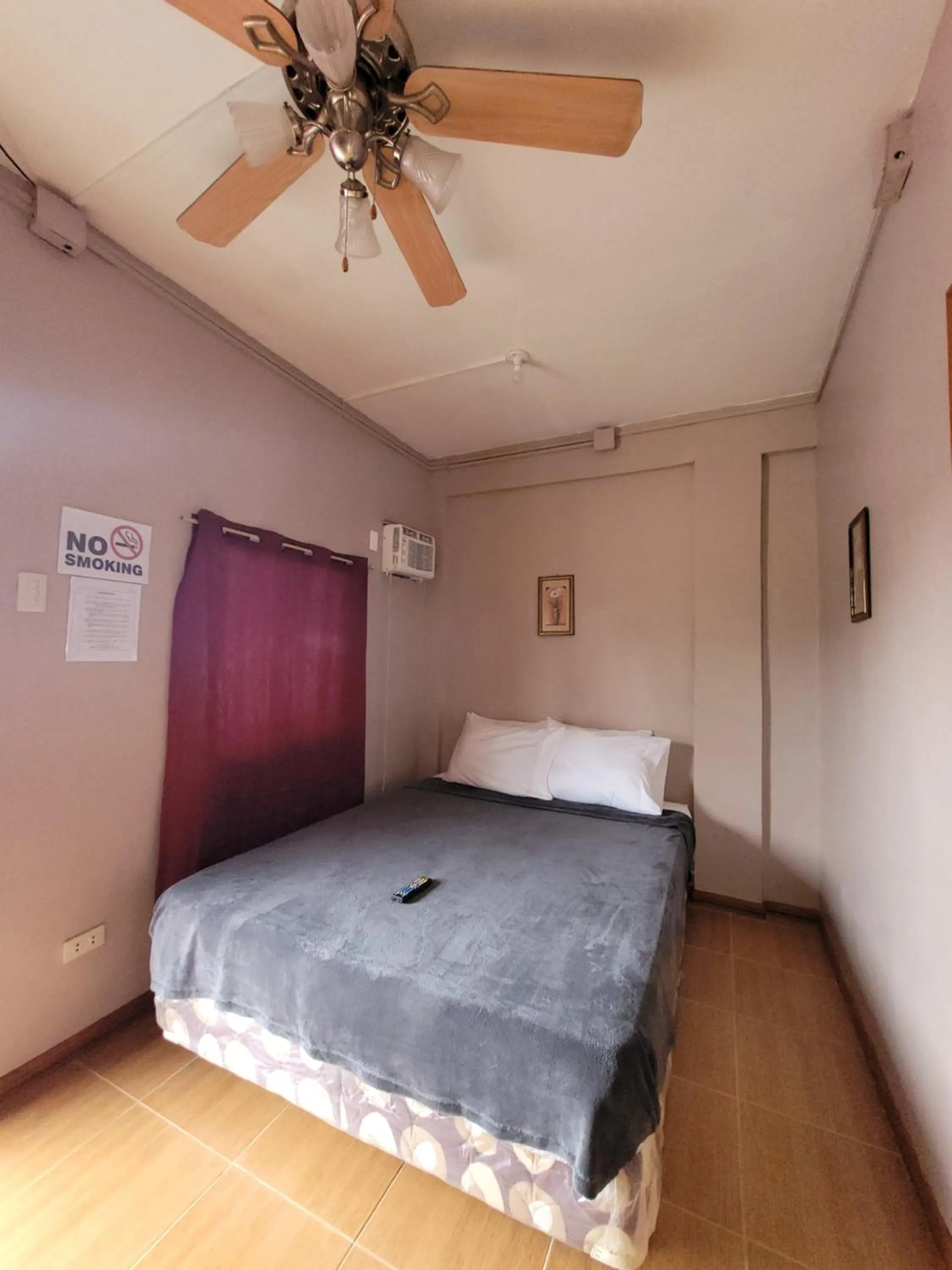 Bed in J & V Oceanview Beach Resort