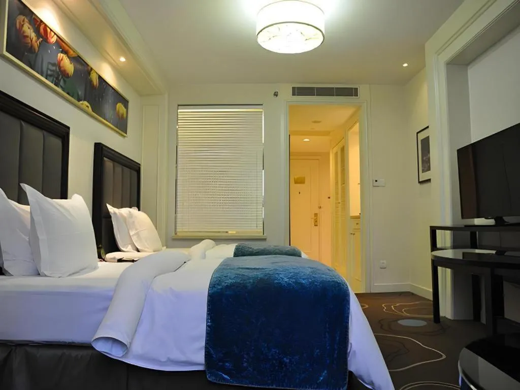 Bed in Jinjiang Metropolo Hotel Classiq YMCA People Square