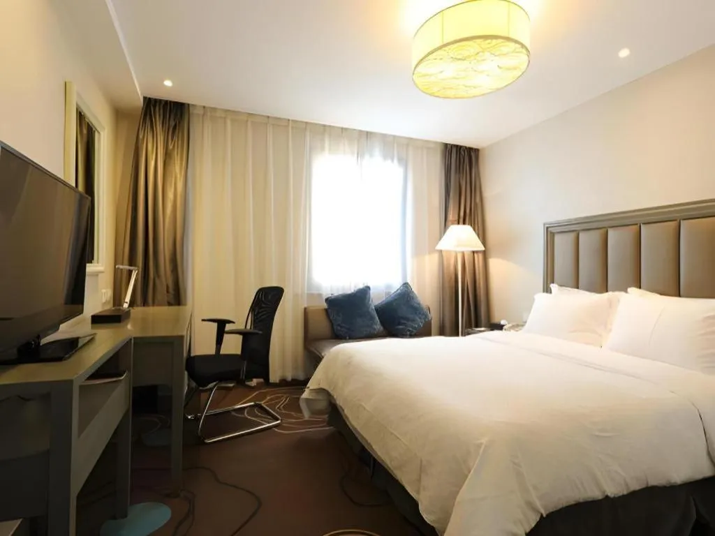 Bed in Jinjiang Metropolo Hotel Classiq YMCA People Square