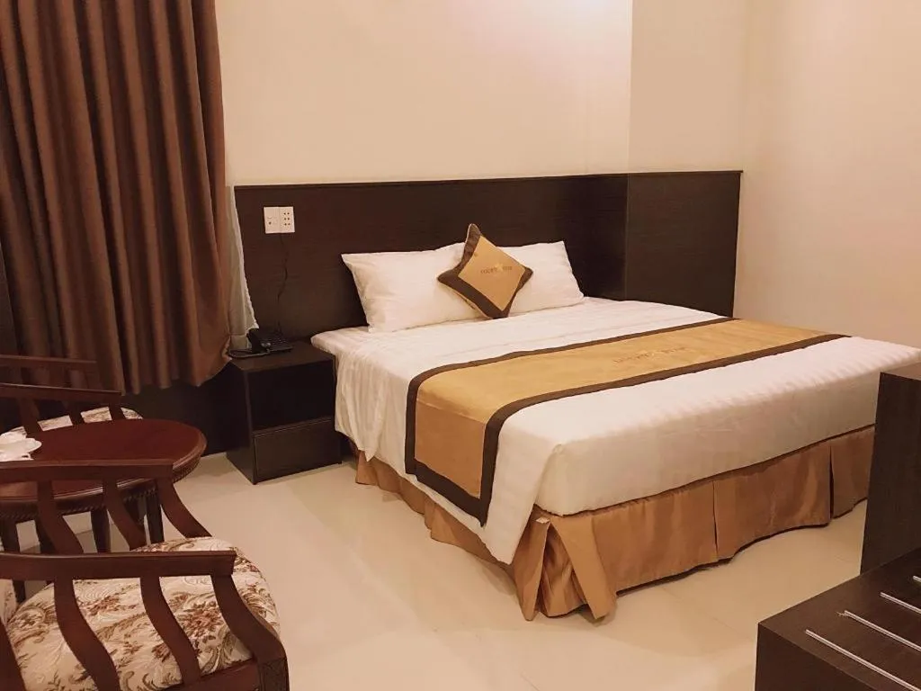 Bed in LUCKY STAR HOTEL