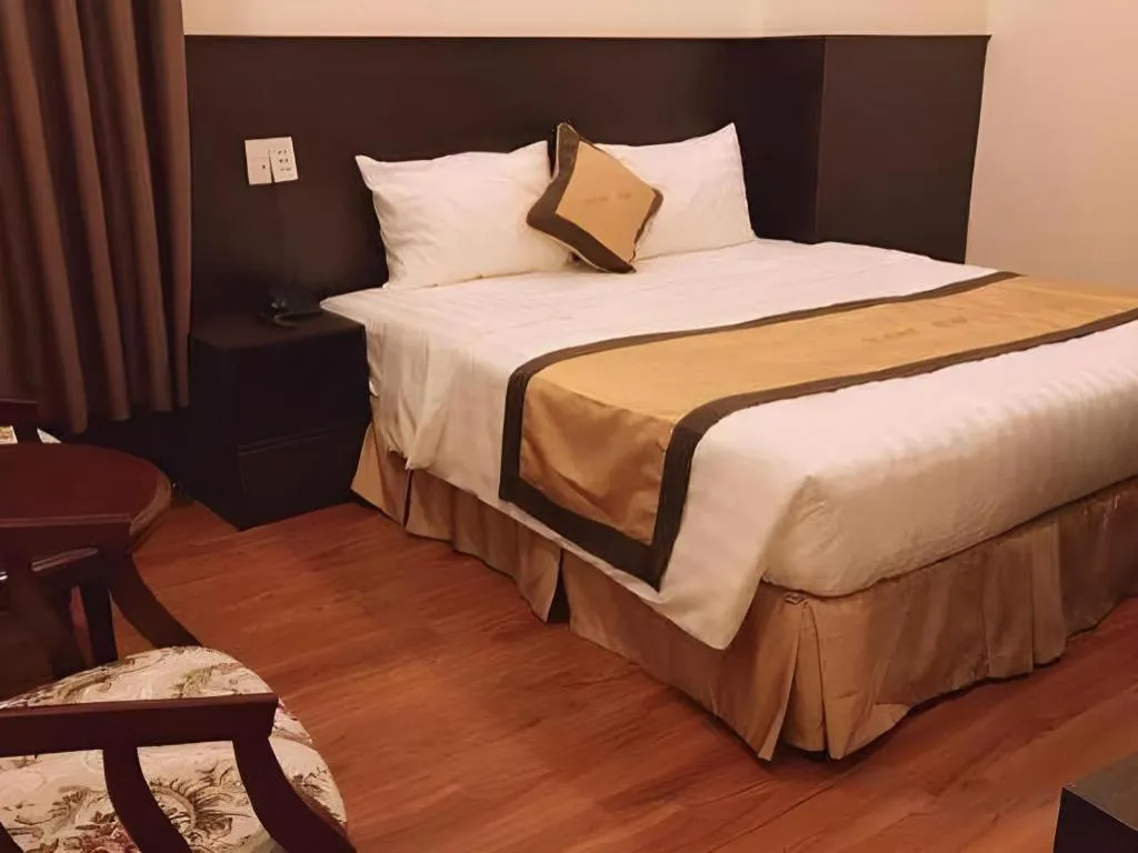 Bed in LUCKY STAR HOTEL