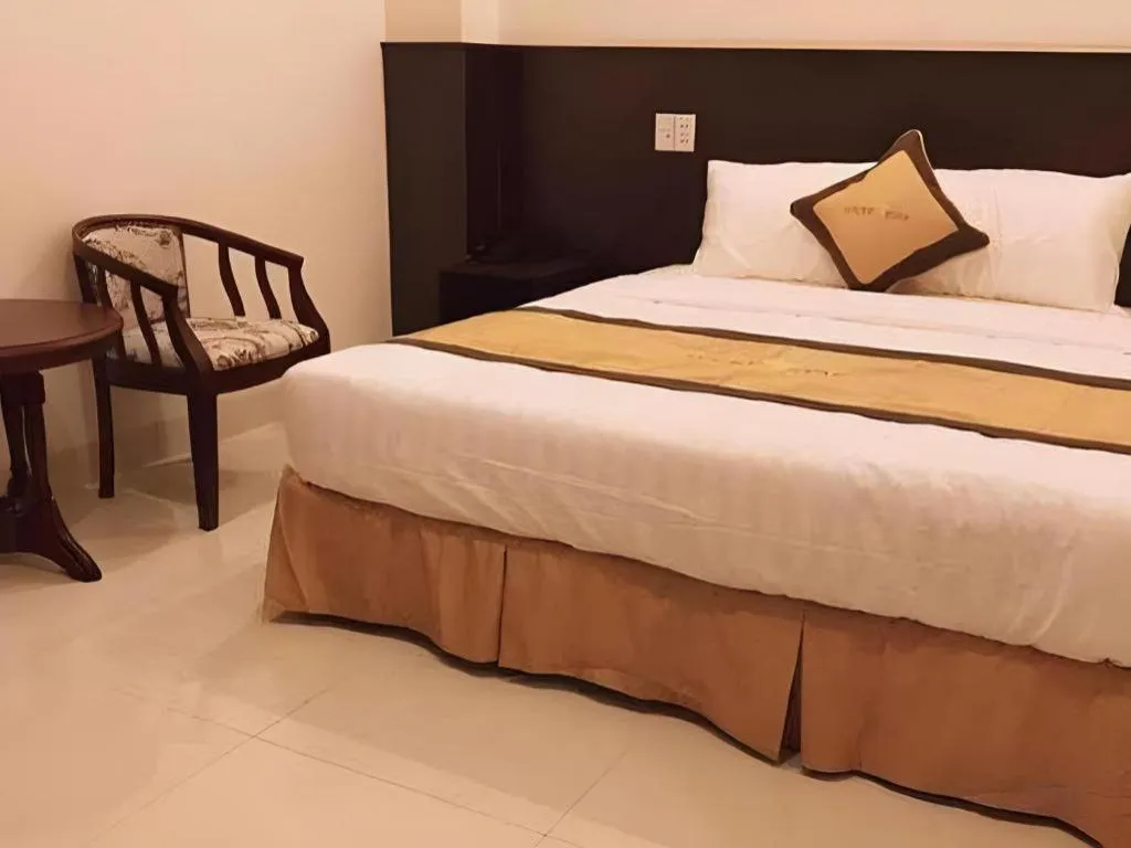 Bed in LUCKY STAR HOTEL