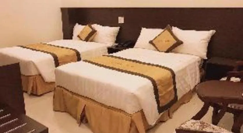 Bed in LUCKY STAR HOTEL