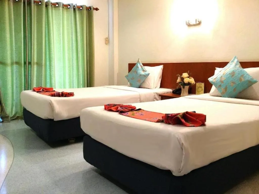 Bed in Wild Orchid Villa Krabi