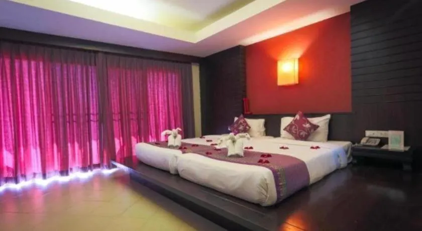 Bed in Wild Orchid Villa Krabi