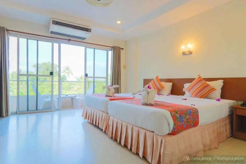 Bed in Wild Orchid Villa Krabi