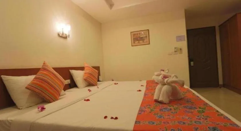 Bed in Wild Orchid Villa Krabi