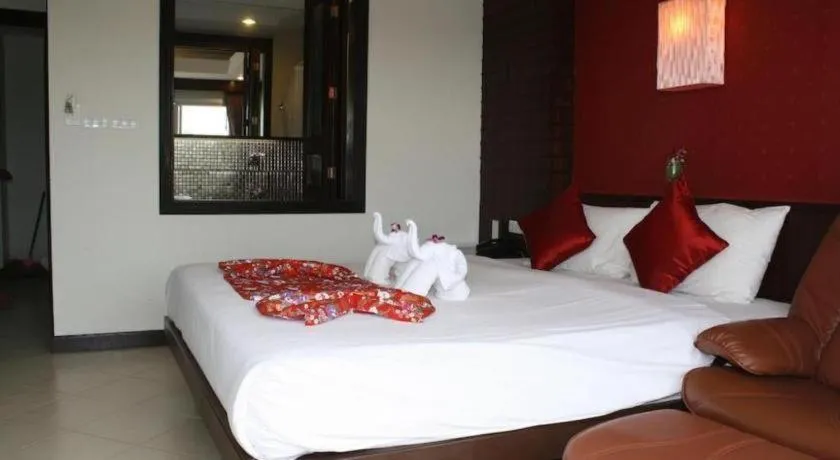 Bed in Wild Orchid Villa Krabi