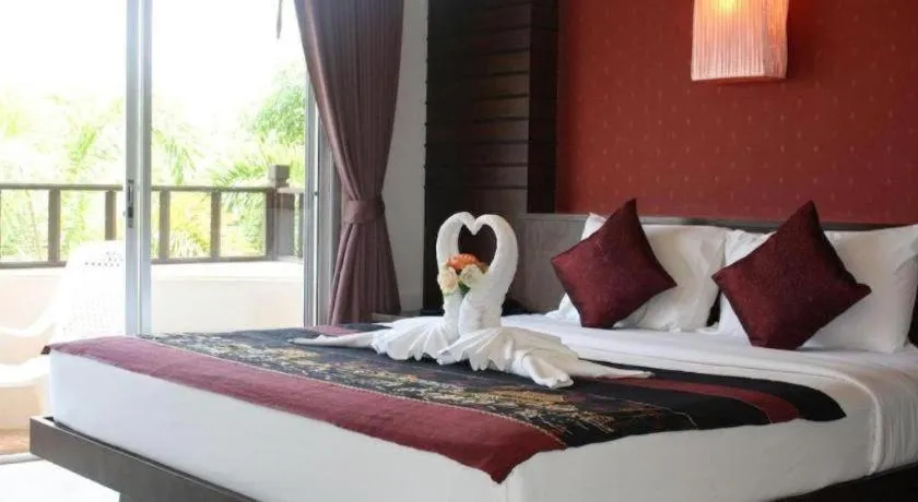 Bed in Wild Orchid Villa Krabi