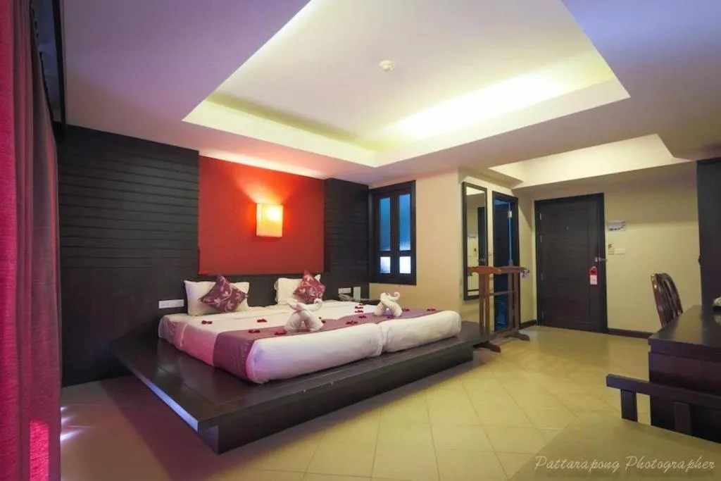 Bed in Wild Orchid Villa Krabi