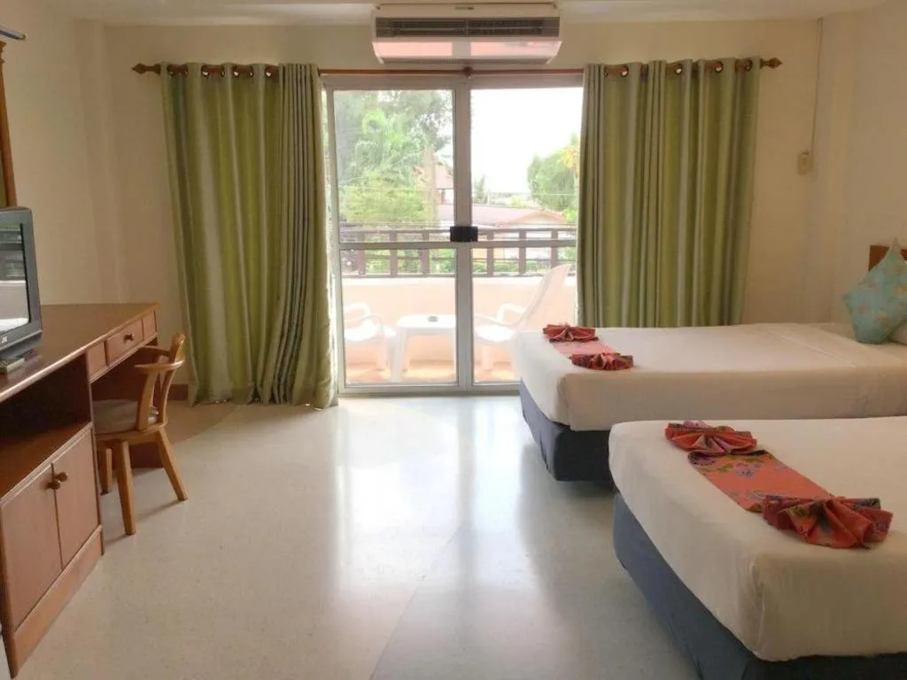 Bed in Wild Orchid Villa Krabi