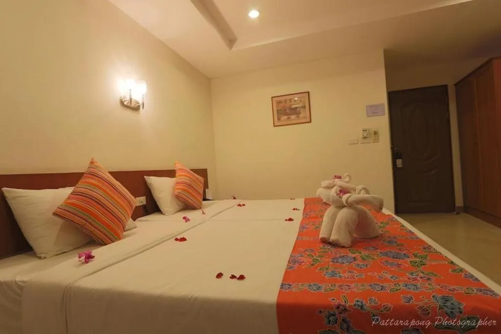 Bed in Wild Orchid Villa Krabi