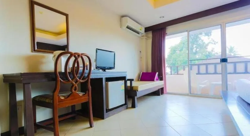 Bed in Wild Orchid Villa Krabi