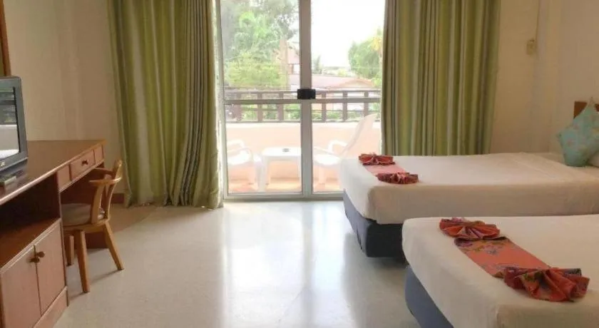 Bed in Wild Orchid Villa Krabi