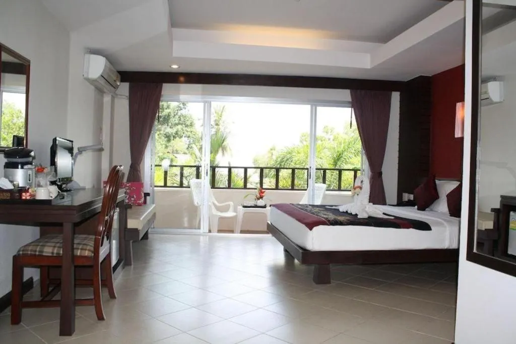 Bed in Wild Orchid Villa Krabi