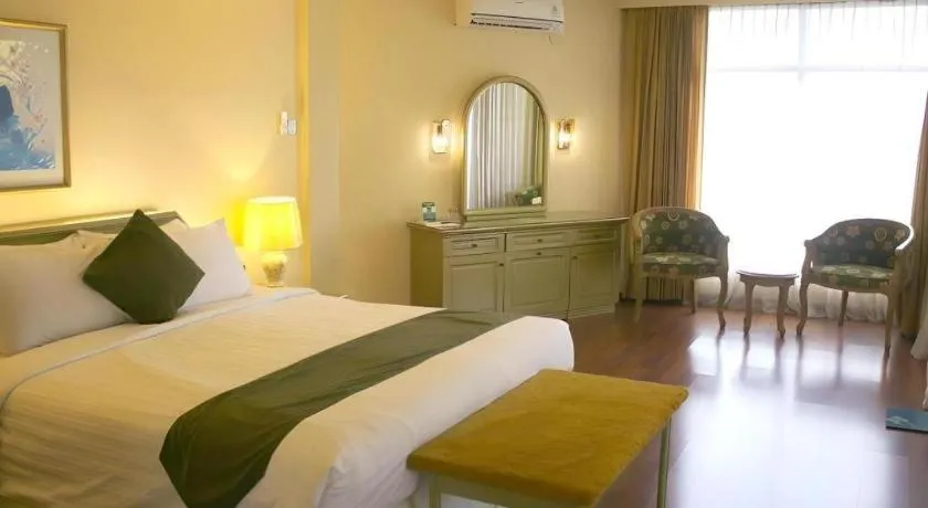 Bed in Purnama Hotel