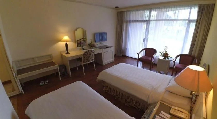 Bed in Purnama Hotel