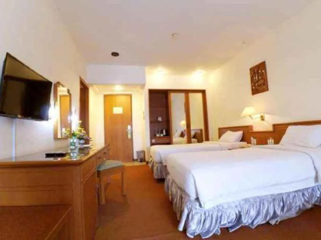 Bed in Purnama Hotel