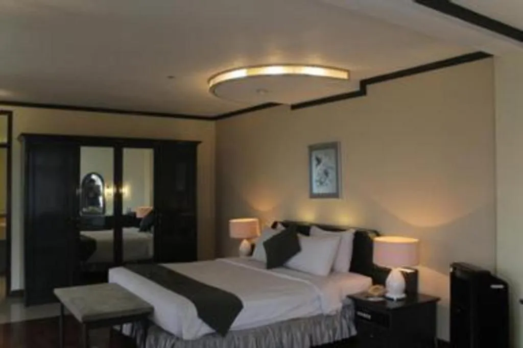 Bed in Purnama Hotel