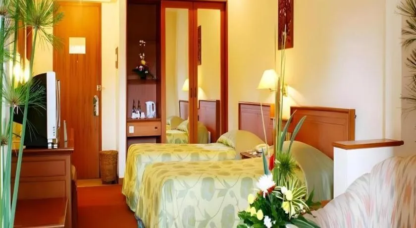 Bed in Purnama Hotel