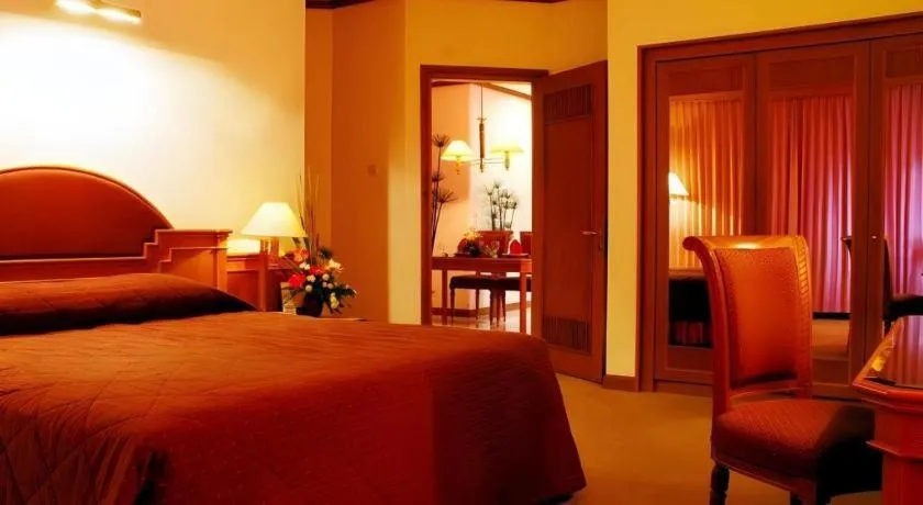 Bed in Purnama Hotel