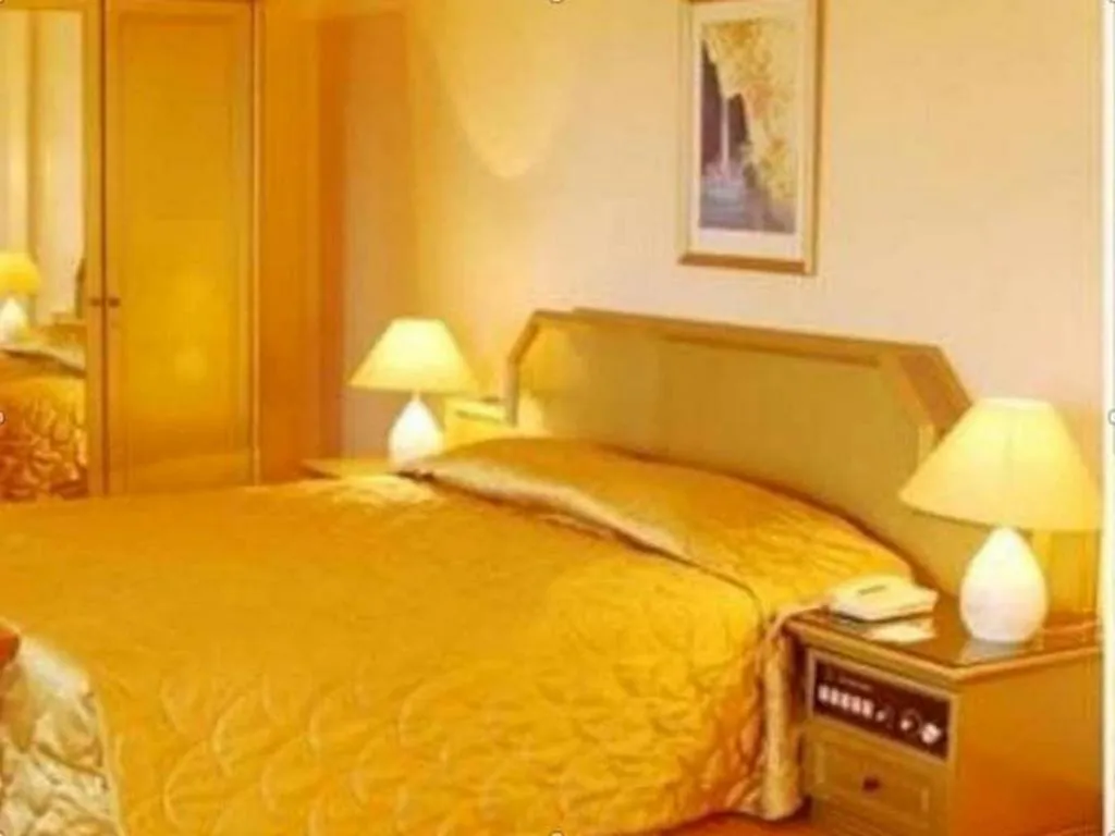 Bed in Purnama Hotel