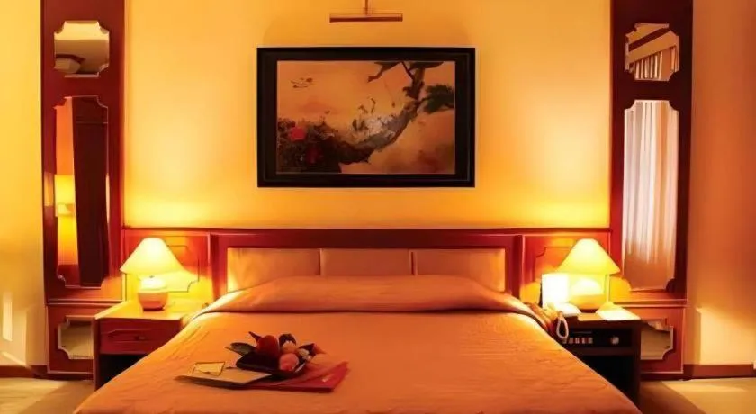 Bed in Purnama Hotel